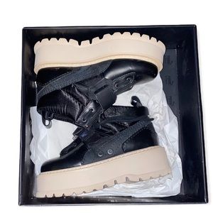 Gently worn Fenty sneaker boots with the strap!